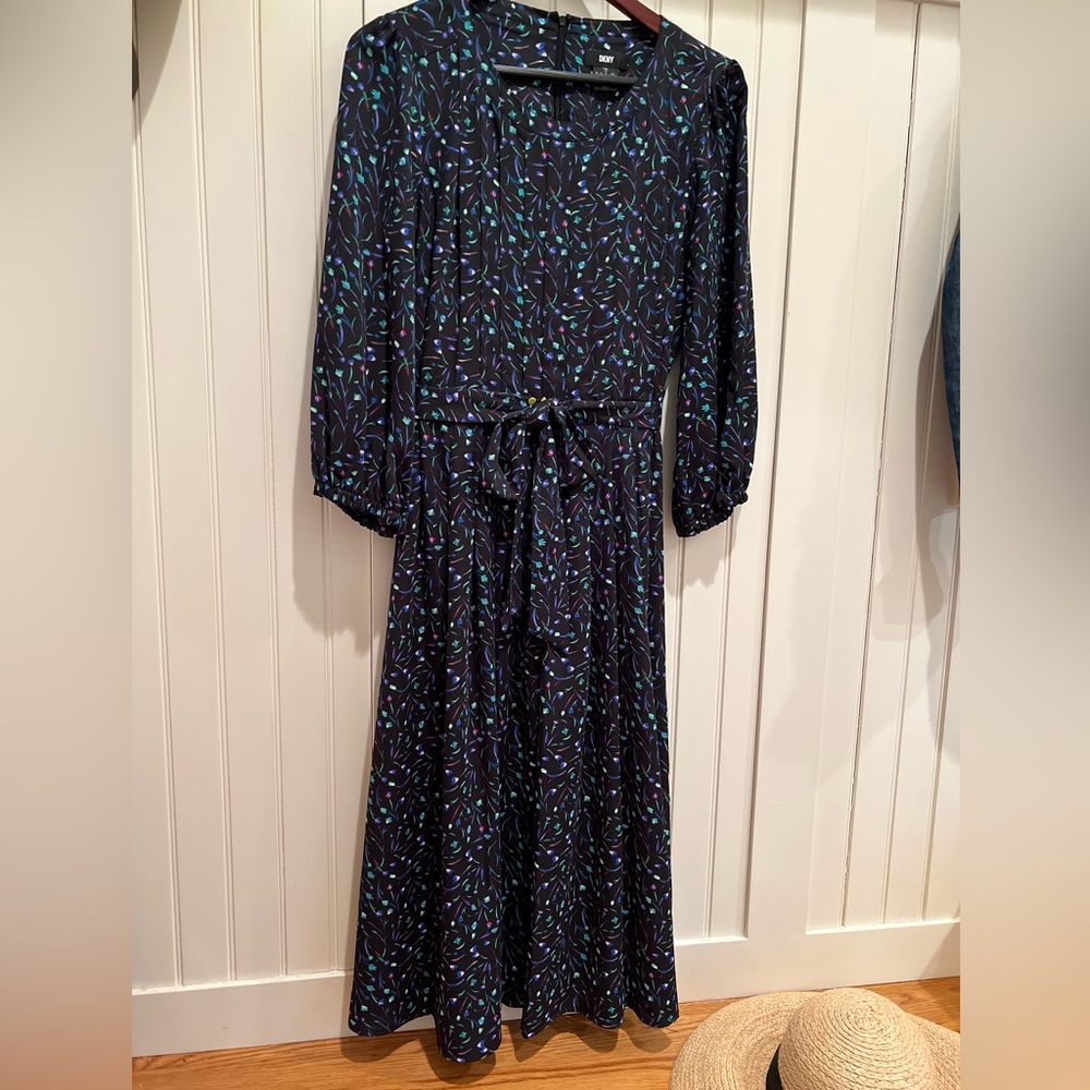 Lovely DKNY Dress with pleated skirt and three-quarter full sleeve.